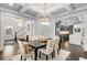 Open concept dining area flowing into a modern kitchen and cozy living room at 327 6Th Ne St, Atlanta, GA 30308
