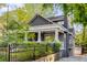 Charming craftsman home with a welcoming front porch and mature landscaping at 327 6Th Ne St, Atlanta, GA 30308