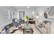 Beautifully decorated living room features a neutral color scheme, modern decor, and lots of natural light at 327 6Th Ne St, Atlanta, GA 30308