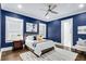Spacious main bedroom with hardwood floors, ensuite bathroom and natural light at 327 6Th Ne St, Atlanta, GA 30308