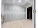 View of a new unfinished room with exposed beams and drywall at 327 6Th Ne St, Atlanta, GA 30308