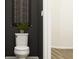 Contemporary half-bathroom featuring a toilet, clean lines, and dark gray walls at 2450 Cotton Ln, Douglasville, GA 30135