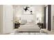Serene bedroom with white upholstered bed, gray accent wall, stylish lamps and modern decor at 2450 Cotton Ln, Douglasville, GA 30135