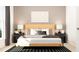 Contemporary bedroom featuring a wooden bed frame, decorative art, and stylish bedside lamps at 2450 Cotton Ln, Douglasville, GA 30135