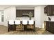 Spacious kitchen island boasts seating, sleek countertops, and stylish cabinetry at 2450 Cotton Ln, Douglasville, GA 30135
