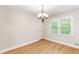 Dining space with natural light, hardwood floors, and white trim at 639 Ladora Dr, Dallas, GA 30157