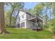 Large home with a two-car garage, and a beautiful yard with a multi-level deck at 639 Ladora Dr, Dallas, GA 30157