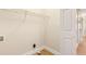 Empty laundry room with shelving and hardwood floors at 639 Ladora Dr, Dallas, GA 30157