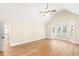 Spacious main bedroom with vaulted ceiling, hardwood floors, and natural light at 639 Ladora Dr, Dallas, GA 30157