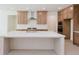 Beautiful kitchen boasts a large island, stainless steel appliances, and abundant cabinet space at 6585 Rhett Run, Cumming, GA 30028