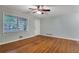 Inviting bedroom with hardwood floors, window, and ceiling fan, creating a cozy and serene atmosphere at 108 Glenn St, Decatur, GA 30030