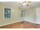 Bedroom features hardwood floors and windows providing natural light, creating a bright and airy space at 108 Glenn St, Decatur, GA 30030