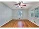 Bright bedroom features hardwood floors, natural light from two windows, and ceiling fan at 108 Glenn St, Decatur, GA 30030