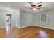 Spacious bedroom with hardwood floors, large windows, and access to an ensuite bathroom at 108 Glenn St, Decatur, GA 30030