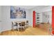 Open dining space with hardwood floors and artwork at 108 Glenn St, Decatur, GA 30030