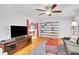 Open living room with built-in shelving, hardwood floors, and comfortable seating at 108 Glenn St, Decatur, GA 30030