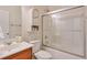 Bathroom with decorative wallpaper, tub and shower combination, vanity with sink and decorative touches at 206 Mountain Vista Blvd, Canton, GA 30115