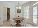 Inviting breakfast nook boasts natural light from large windows and seamless access to outdoor and indoor living spaces at 206 Mountain Vista Blvd, Canton, GA 30115
