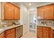 This kitchen offers granite counters, stainless steel appliances, and easy access to a formal dining area at 206 Mountain Vista Blvd, Canton, GA 30115