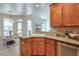 Well-appointed kitchen boasts stainless steel appliances, granite countertops, and an open layout to the breakfast nook at 206 Mountain Vista Blvd, Canton, GA 30115