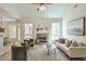 Inviting living room with fireplace, lots of light, and comfortable seating at 206 Mountain Vista Blvd, Canton, GA 30115
