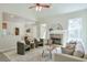 Open-concept living room with fireplace and comfortable seating at 206 Mountain Vista Blvd, Canton, GA 30115