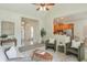 Open-concept living room with view to entrance and kitchen at 206 Mountain Vista Blvd, Canton, GA 30115