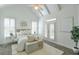 Bright main bedroom with vaulted ceilings, white accents, and french doors at 206 Mountain Vista Blvd, Canton, GA 30115