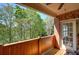 Balcony featuring trees and a brick wall at 636 Parkside Village Nw Way, Marietta, GA 30060