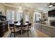 Charming dining area with a chandelier and hardwood floors at 636 Parkside Village Nw Way, Marietta, GA 30060