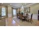Elegant dining room with hardwood floors, and stylish furnishings at 636 Parkside Village Nw Way, Marietta, GA 30060