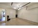 Large garage features a modern speckled floor, plenty of storage, and a door leading to the house at 636 Parkside Village Nw Way, Marietta, GA 30060
