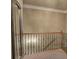 Hallway with decorative railing and large mirror at 636 Parkside Village Nw Way, Marietta, GA 30060