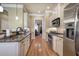 Modern kitchen featuring granite countertops and stainless steel appliances at 636 Parkside Village Nw Way, Marietta, GA 30060