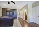Living room with hardwood floors and built in media center with mounted television at 636 Parkside Village Nw Way, Marietta, GA 30060