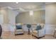 Elegant living room with hardwood floors, ample lighting, and stylish furnishings at 636 Parkside Village Nw Way, Marietta, GA 30060