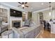 Inviting living room with a cozy fireplace and custom built-in shelving at 636 Parkside Village Nw Way, Marietta, GA 30060