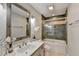 This is a full bath with shower and tub combo at 6460 Pine Ridge Cir, Cumming, GA 30041