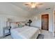 Bedroom with a neutral color palette and ample natural light at 6460 Pine Ridge Cir, Cumming, GA 30041