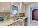 This is a kitchen view featuring granite countertops and stainless appliances at 6460 Pine Ridge Cir, Cumming, GA 30041