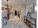 This galley kitchen offers granite countertops and travertine tile flooring at 6460 Pine Ridge Cir, Cumming, GA 30041