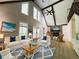 Bright living room boasts vaulted ceilings, hardwood floors, and lots of natural light at 6460 Pine Ridge Cir, Cumming, GA 30041