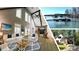 Bright living room boasts vaulted ceilings, hardwood floors, and lots of natural light at 6460 Pine Ridge Cir, Cumming, GA 30041