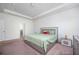 Spacious bedroom with a gray bed frame, neutral walls, a crib, and recessed lighting at 224 Gallant Fox Way, Acworth, GA 30102