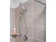 Close-up of shower with chrome shower head and tiled walls at 224 Gallant Fox Way, Acworth, GA 30102