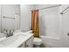 Bathroom with a shower and tub combination and a sink and vanity at 4565 Grenadine Cir, Acworth, GA 30101