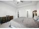 Bright and spacious bedroom with carpet, tray ceiling, and ample closet space for storage at 4565 Grenadine Cir, Acworth, GA 30101