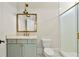 Contemporary bathroom features a walk-in shower with decorative tiles and stylish vanity with gold accents at 4976 Concert Ln, Marietta, GA 30066