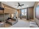 Bedroom with a bunk bed, a comfortable seating area, and large window at 4976 Concert Ln, Marietta, GA 30066