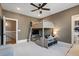 Neutral bedroom features a unique bunk bed design with an integrated TV and a cozy seating area at 4976 Concert Ln, Marietta, GA 30066